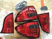 Фонари тюнинг eagle eyes диодные красно-тонированные новые Mitsubishi Pajero Sport 2008-2015